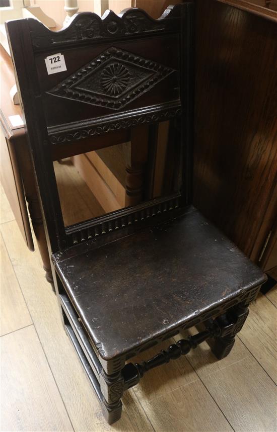 A late 17th century oak wood seat chair, with lozenge carved panelled back	